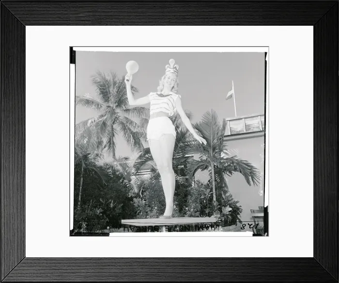 Framed Print : Sandy Wirth Holding a Light Bulb Framed Print : Sandy Wirth Holding a Light Bulb