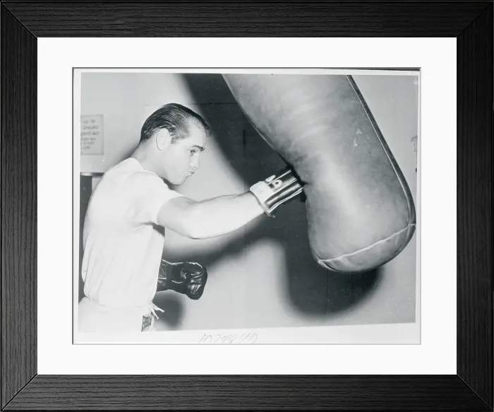 Framed Print : Carl Olson Hitting a Punching Bag Framed Print : Carl Olson Hitting a Punching Bag