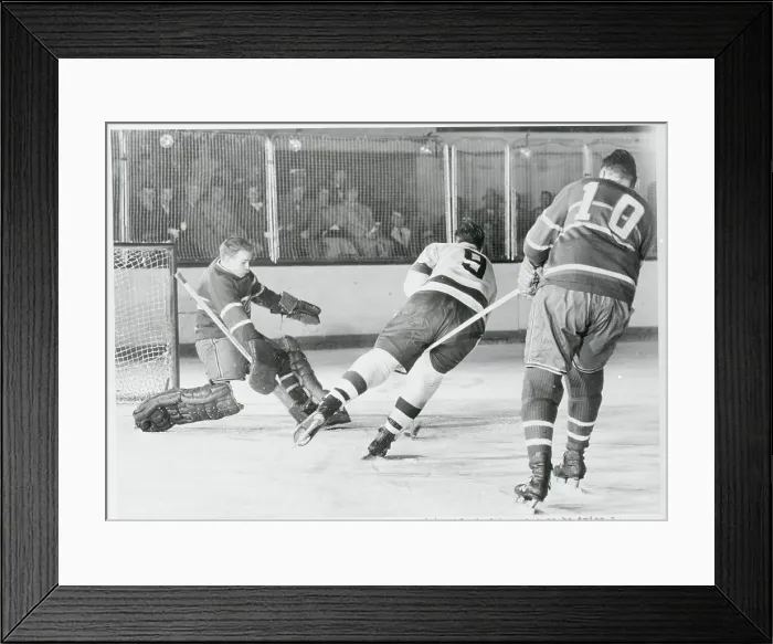 Framed Print : Gordie Howe Getting Checked Framed Print : Gordie Howe Getting Checked