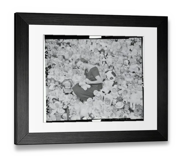 Framed Print : Woman in a Room of Dolls Framed Print : Woman in a Room of Dolls