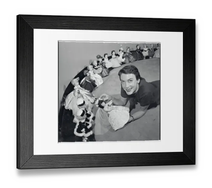 Framed Print : Geraldine Worley Displaying Fashion Dolls