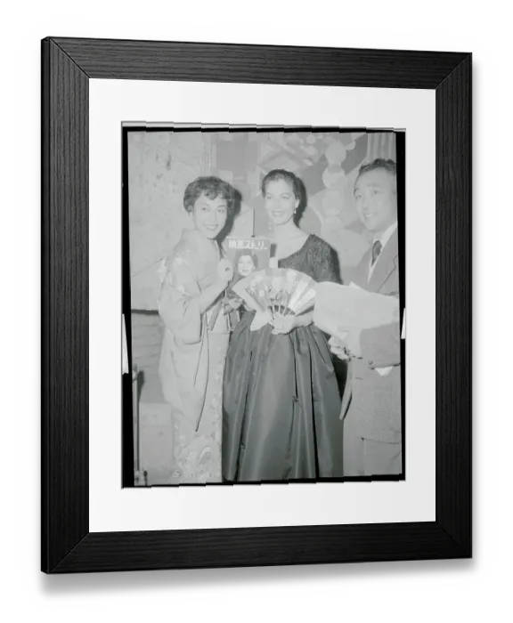 Framed Print : Ava Gardner Holding a Fan and Magazine Framed Print : Ava Gardner Holding a Fan and Magazine