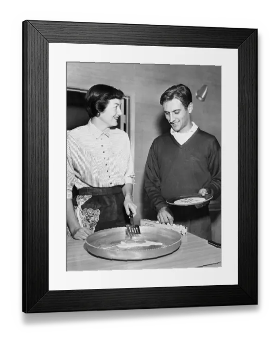 Framed Print : Woman Frying Eggs Framed Print : Woman Frying Eggs