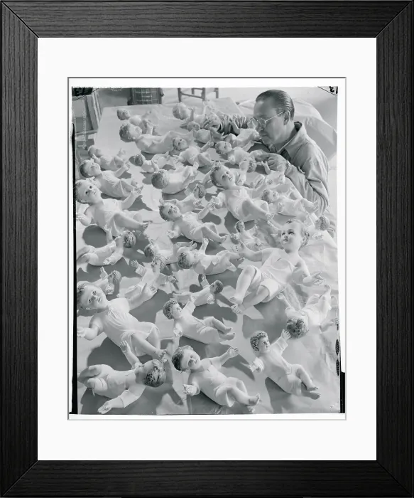Framed Print : Craftsman Working on Statuettes Framed Print : Craftsman Working on Statuettes