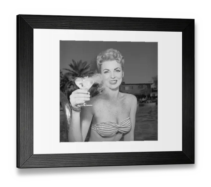 Framed Print : Joan Sanders Holding a Cocktail Framed Print : Joan Sanders Holding a Cocktail