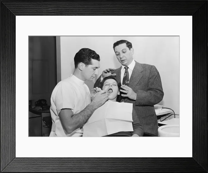 Framed Print : Dentist Working on Patient Framed Print : Dentist Working on Patient