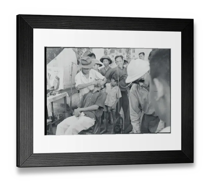 Framed Print : Sidewalk Dentist Tending to Patient
