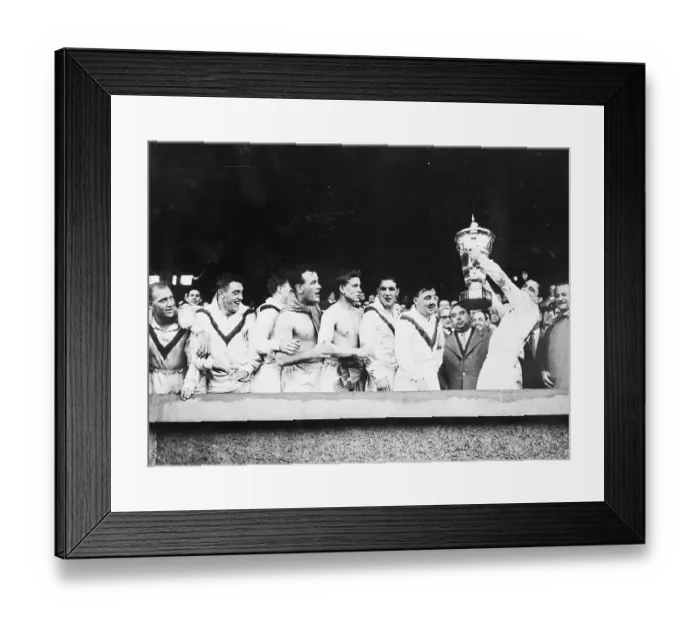 Framed Print : Rugby Players Holding Up Their Trophy Framed Print : Rugby Players Holding Up Their Trophy
