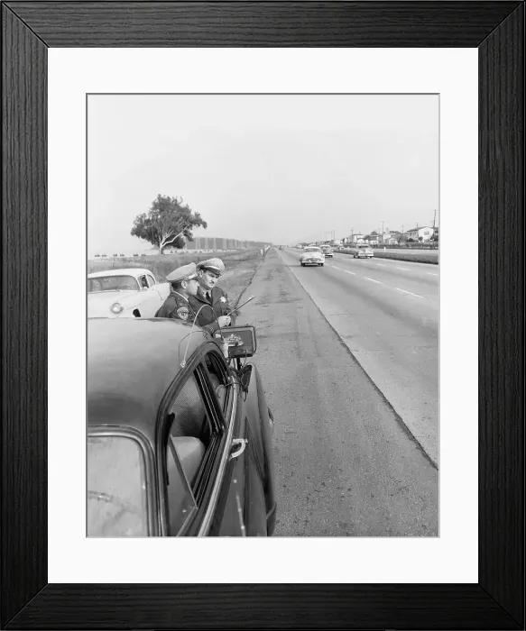 Framed Print : Officers Looking at a Clipboard Framed Print : Officers Looking at a Clipboard