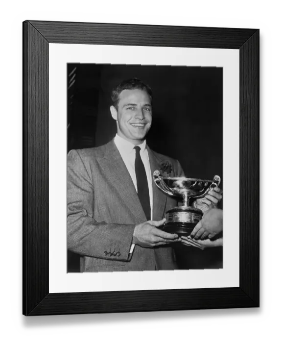 Framed Print : Marlon Brando Holding a Trophy Framed Print : Marlon Brando Holding a Trophy