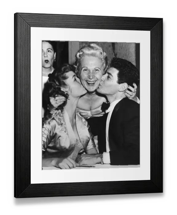 Framed Print : Debbie Reynolds and Eddie Fisher Kissing Jennie Grossinger