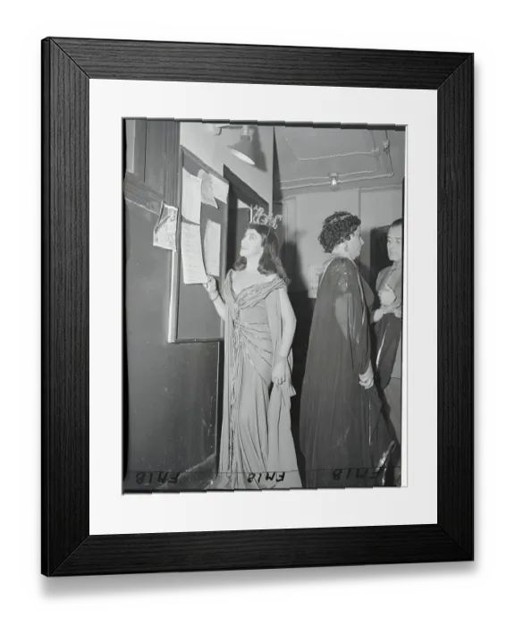 Framed Print : Zinka Milanov Reading a Bulletin Board