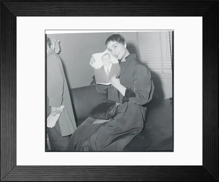 Framed Print : Josiane Berenger Holding a Picture of Marlon Brando