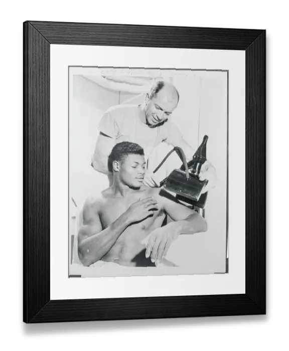 Framed Print : JC Caroline Getting Shoulder Treated by Dick Klein Framed Print : JC Caroline Getting Shoulder Treated by Dick Klein