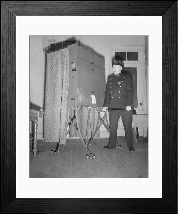 Framed Print : Policeman Guarding Voting Booth Framed Print : Policeman Guarding Voting Booth