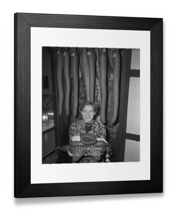 Framed Print : Woman Holding Assortment of Sausage Meats Framed Print : Woman Holding Assortment of Sausage Meats