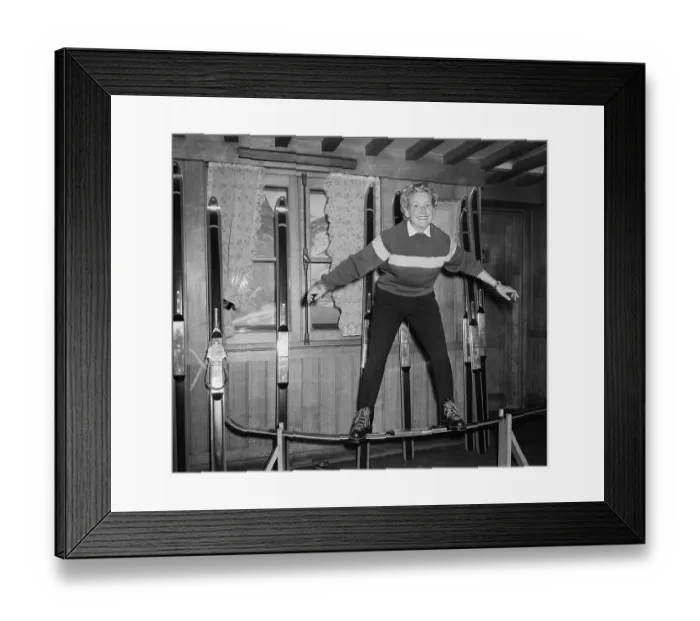 Framed Print : Suzanne Thiolliere Balancing Herself on Ski Framed Print : Suzanne Thiolliere Balancing Herself on Ski