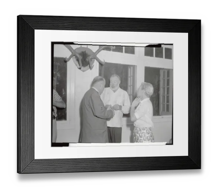 Framed Print : Ernest Hemingway Talking to Reporters at Home Framed Print : Ernest Hemingway Talking to Reporters at Home