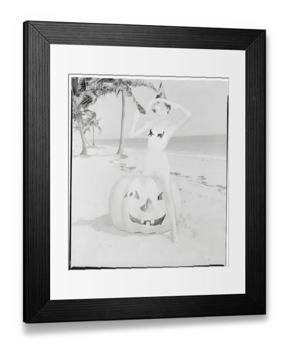 Framed Print : Female Sitting Atop Halloween Pumpkin Framed Print : Female Sitting Atop Halloween Pumpkin