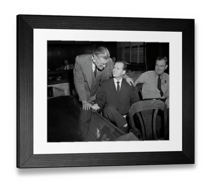 Framed Print : Dr. Samuel Sheppard Smiles at His Father During Trial