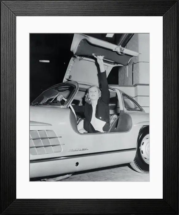 Framed Print : Young Woman Sitting in Sports Car