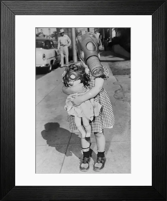 Framed Print : Girl Wearing a Muzzled Mask and Holding a Doll