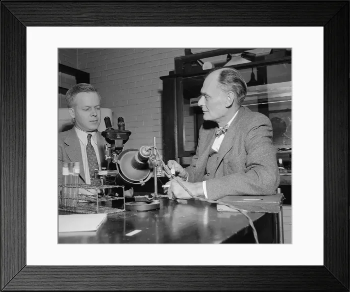 Framed Print : Thomas Weller Speaking With John Enders Framed Print : Thomas Weller Speaking With John Enders