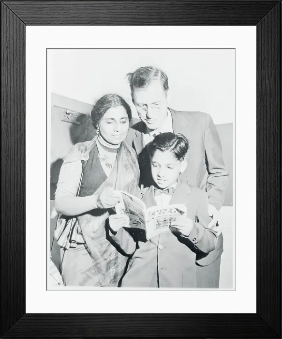 Framed Print : Mr. and Mrs. Harvey Renfrew Reading With Their Son Framed Print : Mr. and Mrs. Harvey Renfrew Reading With Their Son