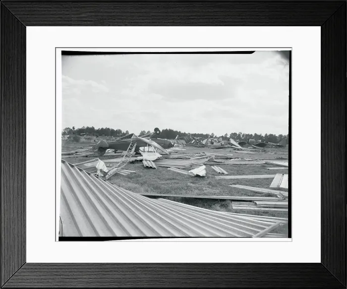 Framed Print : Pieces of Hangars Littering the Ground Framed Print : Pieces of Hangars Littering the Ground