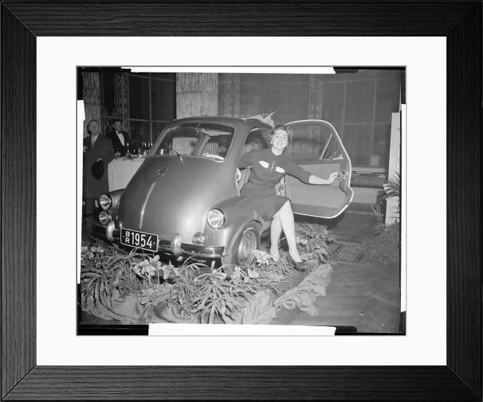 Framed Print : Woman Sitting in a Hoffman Autokabine 250 Auto