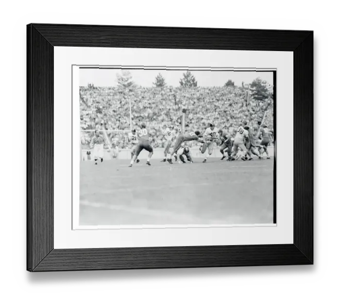 Framed Print : Bill Murakowski Avoiding a Tackle