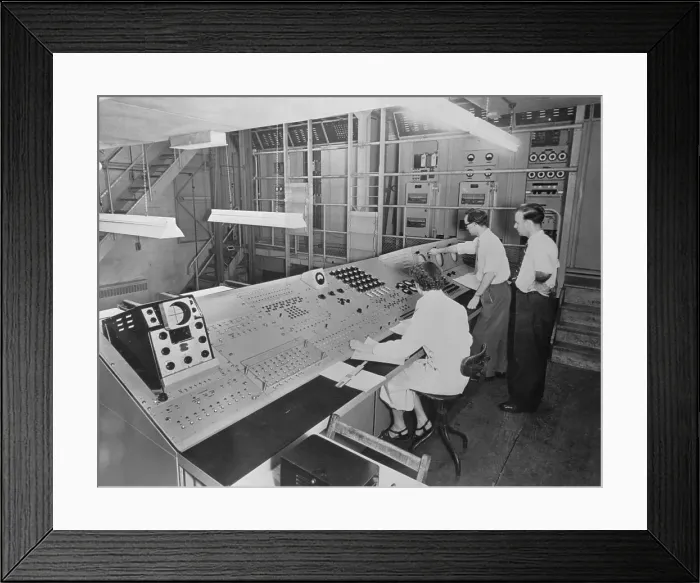 Framed Print : People Working at the Tridac Control Panel