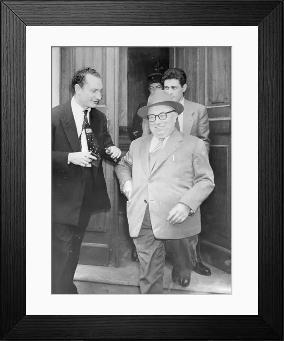 Framed Print : Jacques Duclos Exiting a Building Framed Print : Jacques Duclos Exiting a Building