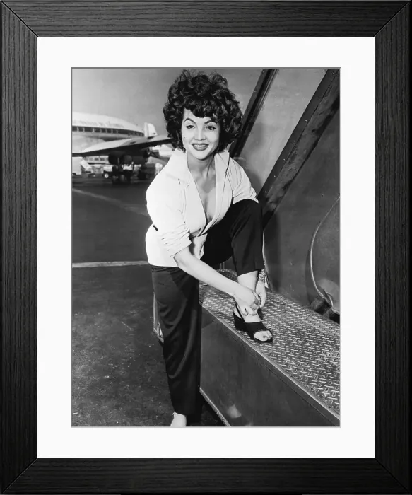 Framed Print : Sarita Montiel Fxing Her Shoe Framed Print : Sarita Montiel Fxing Her Shoe