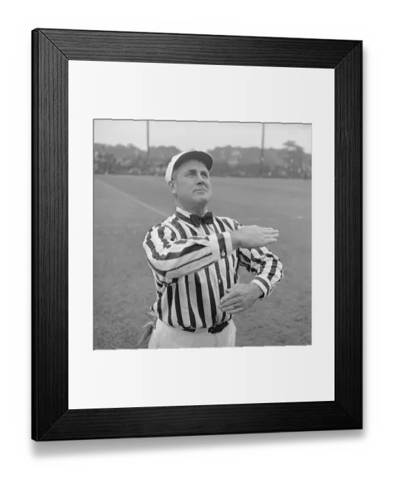 Framed Print : Referee Demonstrating a Football Signal Framed Print : Referee Demonstrating a Football Signal
