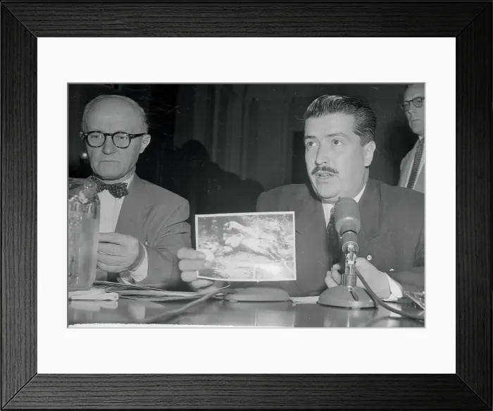 Framed Print : Raul Midence Holding a Photograph Framed Print : Raul Midence Holding a Photograph