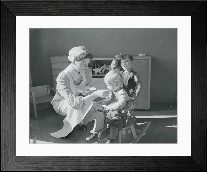 Framed Print : Nurse Giving Vitamins to Children Framed Print : Nurse Giving Vitamins to Children