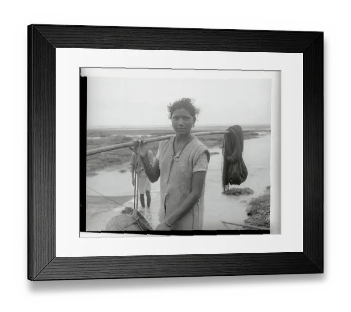 Framed Print : Woman Holding a Pole Framed Print : Woman Holding a Pole