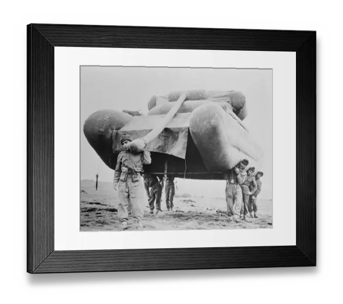 Framed Print : Soldiers Carrying an Inflatable Tank Framed Print : Soldiers Carrying an Inflatable Tank