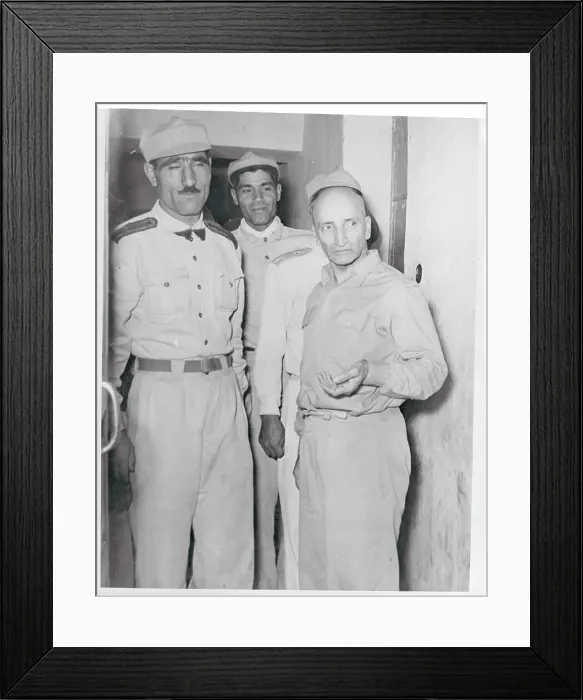 Framed Print : Colonel Seiamak Being Escorted Outside of Court