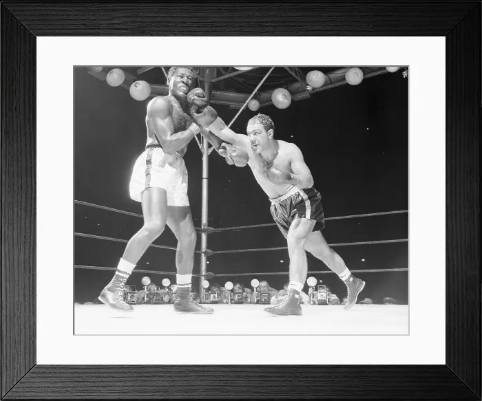 Framed Print : Rocky Marciano Punching Ezzard Charles Framed Print : Rocky Marciano Punching Ezzard Charles