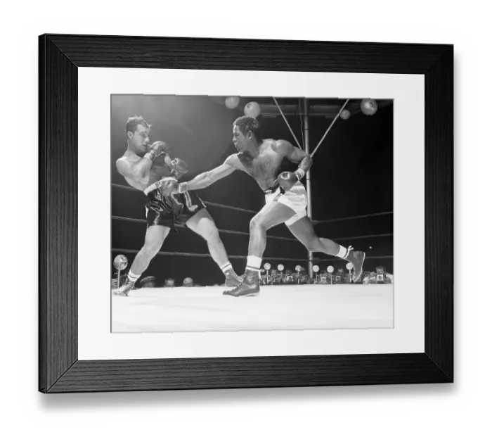 Framed Print : Ezzard Charles Throws Punch @ R.Marciano