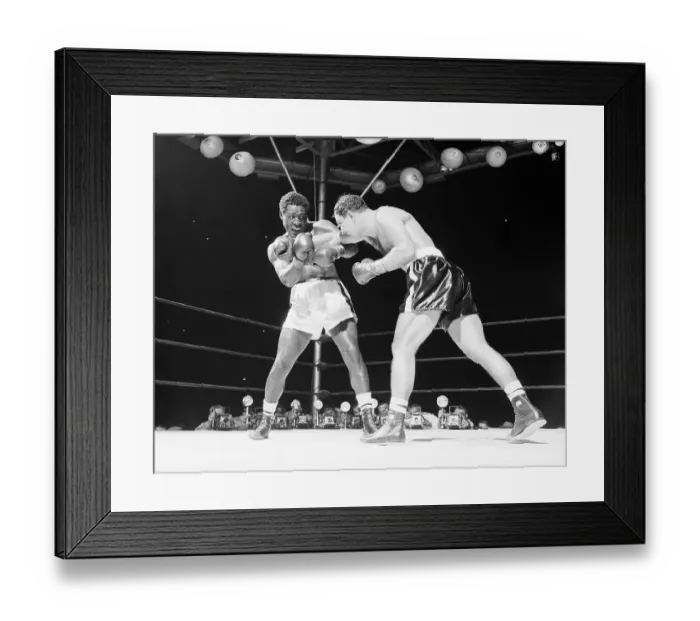 Framed Print : Rocky Marciano Punching Ezzard Charles Framed Print : Rocky Marciano Punching Ezzard Charles