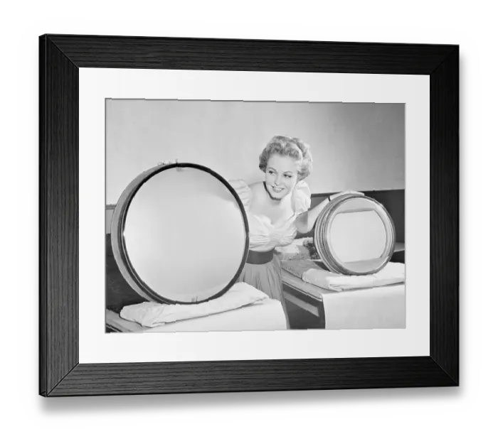 Framed Print : Woman Showing New Television Sets Framed Print : Woman Showing New Television Sets