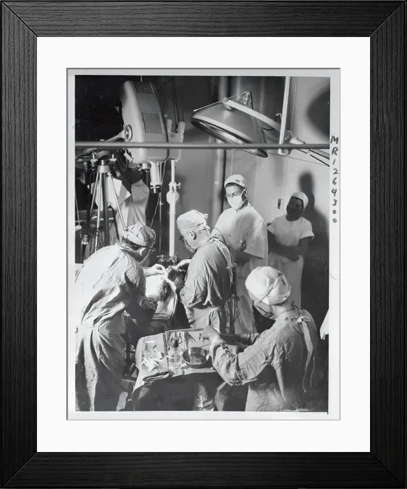 Framed Print : Doctor Performing Surgery Framed Print : Doctor Performing Surgery