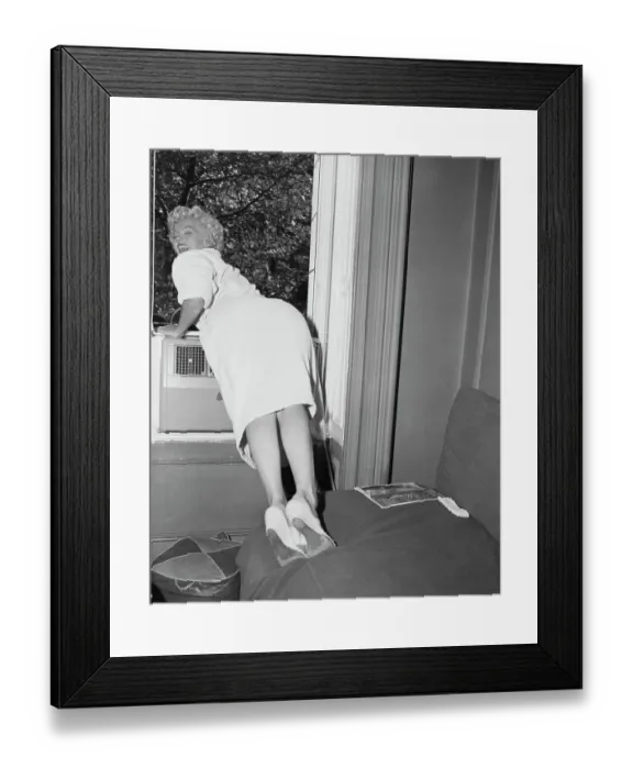 Framed Print : Mariyln Monroe Leaning on Window Sill Framed Print : Mariyln Monroe Leaning on Window Sill