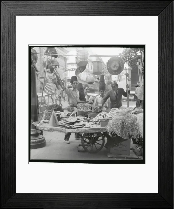 Framed Print : Vendors Selling Paper Hats Framed Print : Vendors Selling Paper Hats