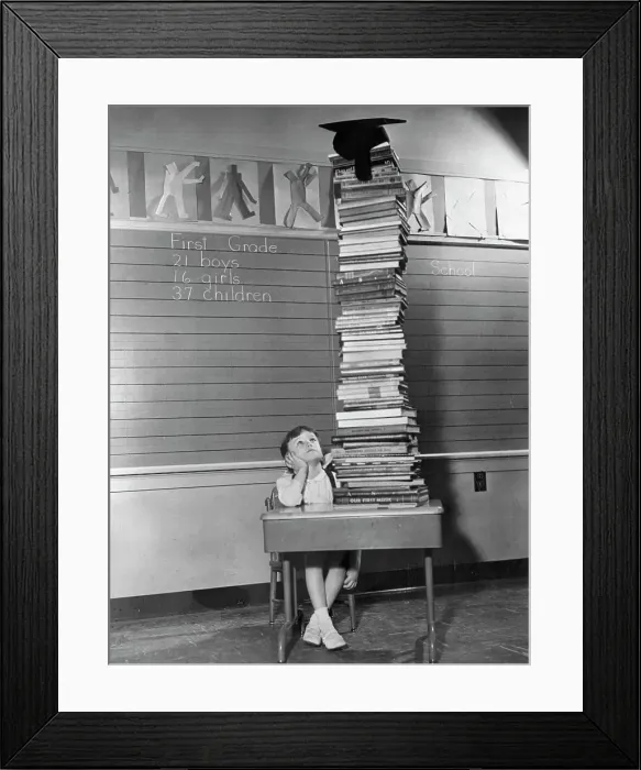Framed Print : Six-Year-Old Peggy Wolverton Staring at School Books Framed Print : Six-Year-Old Peggy Wolverton Staring at School Books