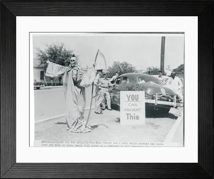 Framed Print : The Grim Reaper Standing Next to a Car Framed Print : The Grim Reaper Standing Next to a Car