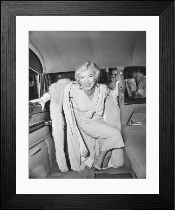 Framed Print : Marilyn Monroe Boarding a Car Framed Print : Marilyn Monroe Boarding a Car